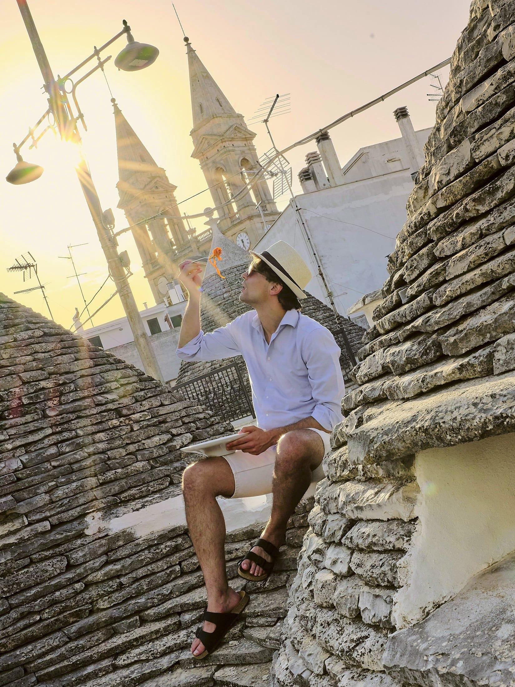 La cena sul tetto dei trulli, al tramonto, con la Basilica sullo sfondo