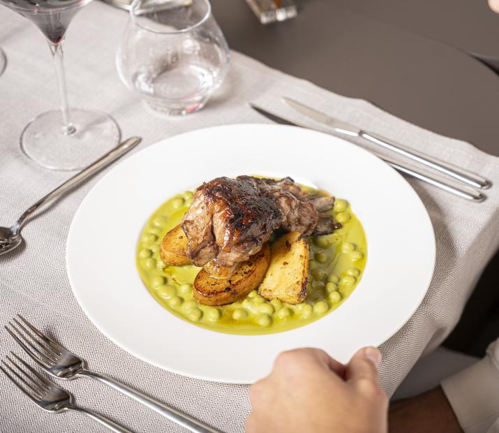 Meat dish with potatoes and pea puree.